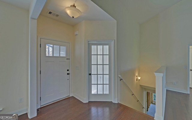 foyer with dark wood-type flooring