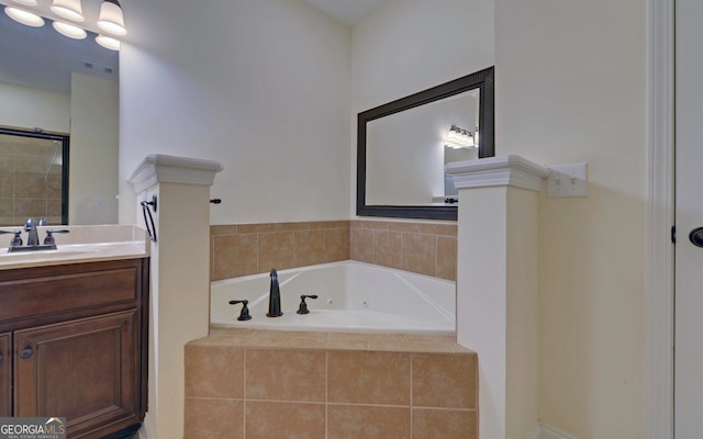 bathroom featuring vanity and shower with separate bathtub