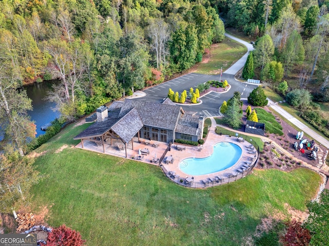 birds eye view of property featuring a water view