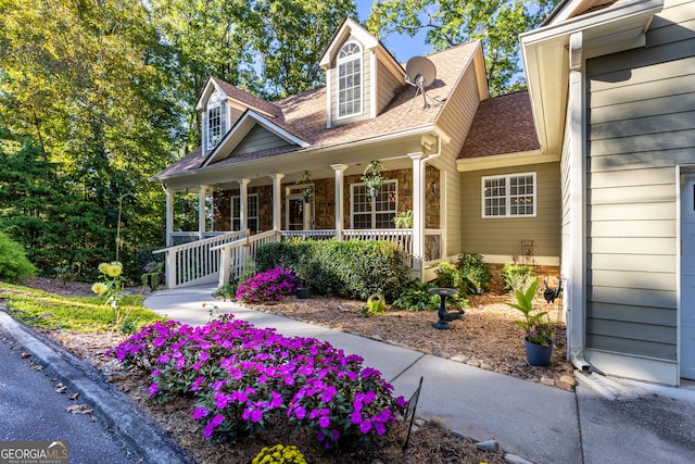 view of front of property featuring covered porch