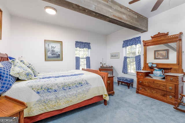 bedroom with light carpet, beam ceiling, and ceiling fan