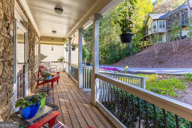 wooden terrace with covered porch