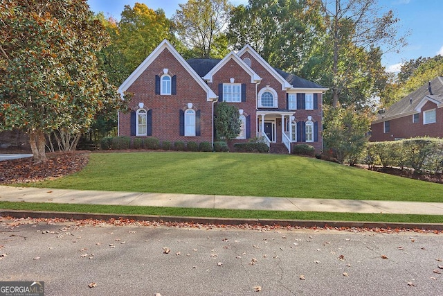 view of front of home with a front lawn