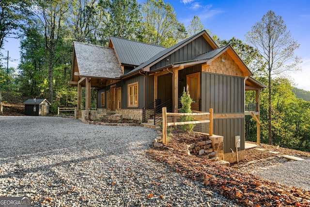 view of home's exterior with a shed