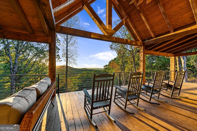 deck with an outdoor hangout area