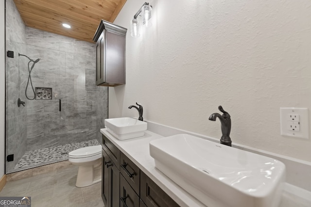 bathroom featuring wooden ceiling, toilet, vanity, an enclosed shower, and tile patterned flooring