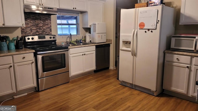 kitchen with stainless steel electric stove, white cabinets, light wood-type flooring, dishwasher, and white refrigerator with ice dispenser