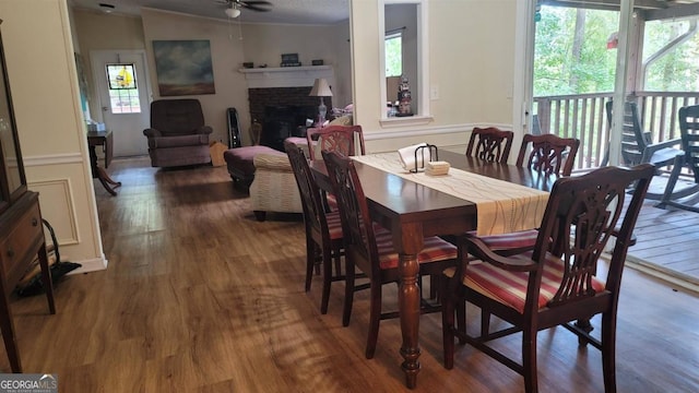 dining room featuring dark wood-type flooring and ceiling fan