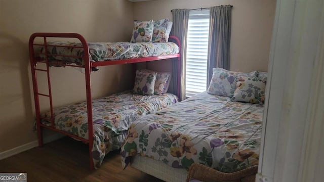 bedroom with hardwood / wood-style flooring