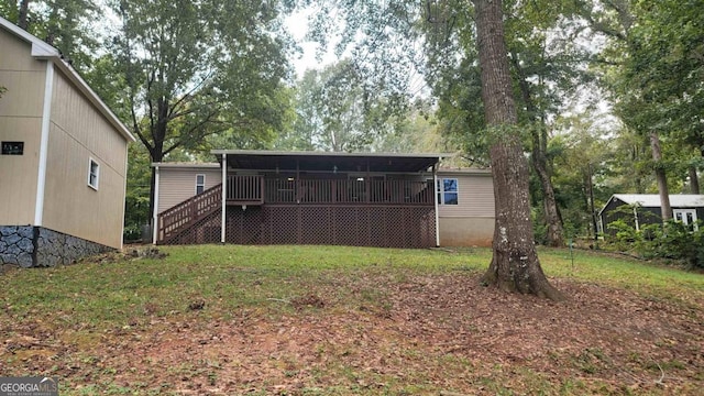 view of yard with a deck