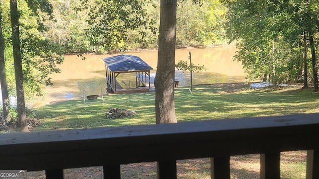 exterior space with a water view and a gazebo