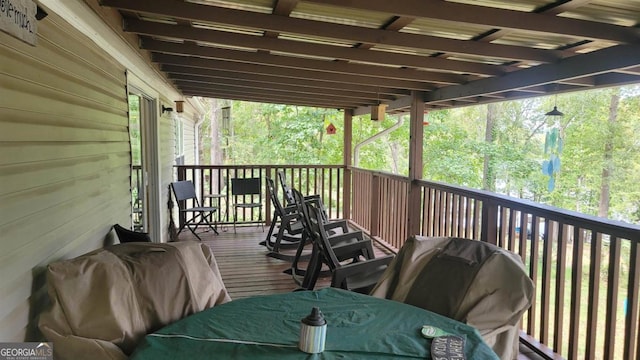 deck featuring a grill