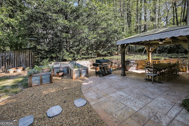 view of patio with a gazebo and a grill