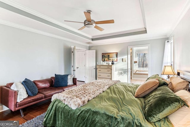 bedroom with ceiling fan, ornamental molding, ensuite bathroom, and dark hardwood / wood-style floors