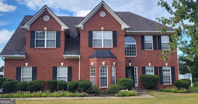 view of front of property with a front yard