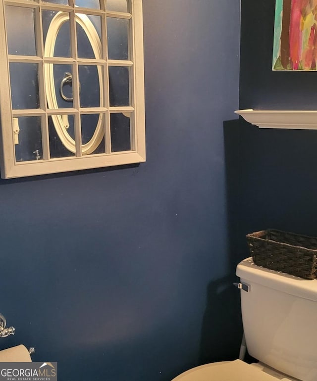 bathroom featuring toilet