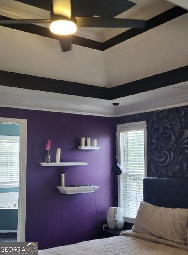 bedroom featuring ceiling fan and ornamental molding