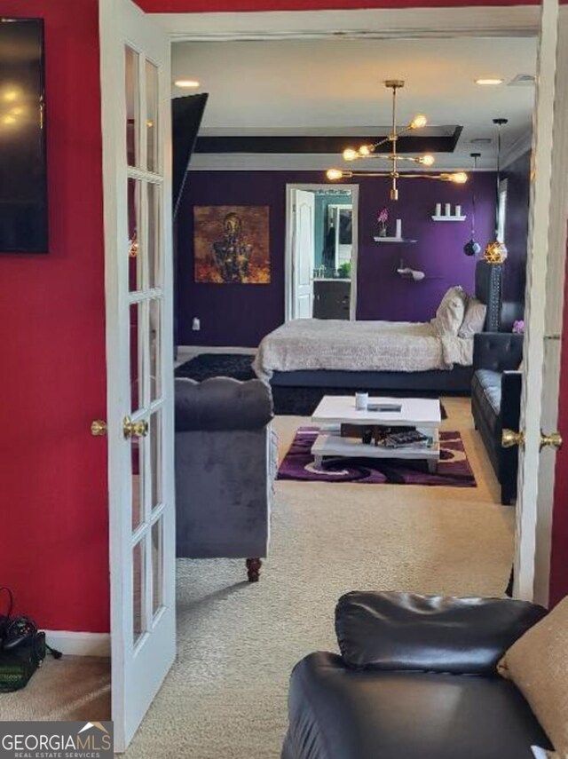 interior space with carpet floors and french doors