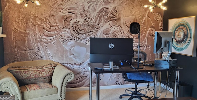 office area with carpet floors and an inviting chandelier