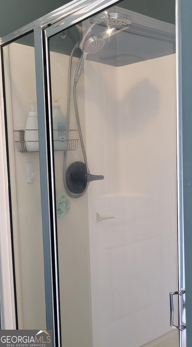 bathroom with an enclosed shower