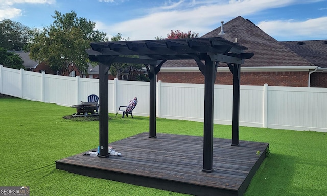 wooden deck with a pergola and a yard