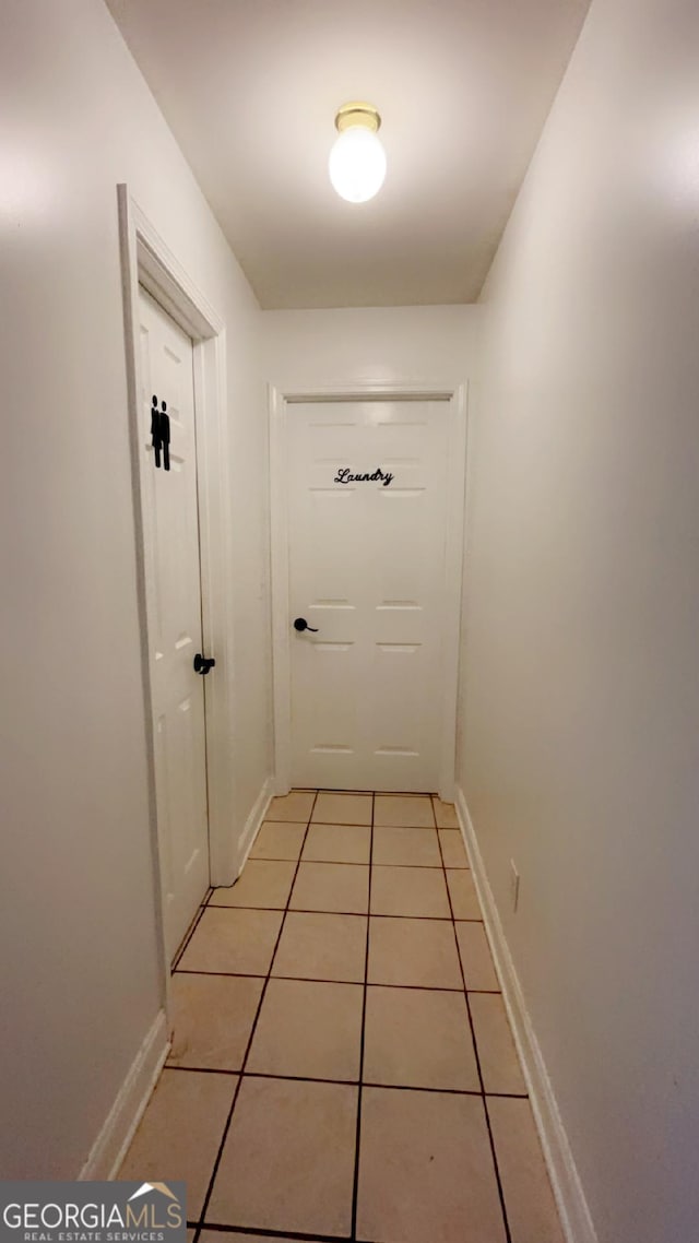 entryway featuring light tile patterned flooring