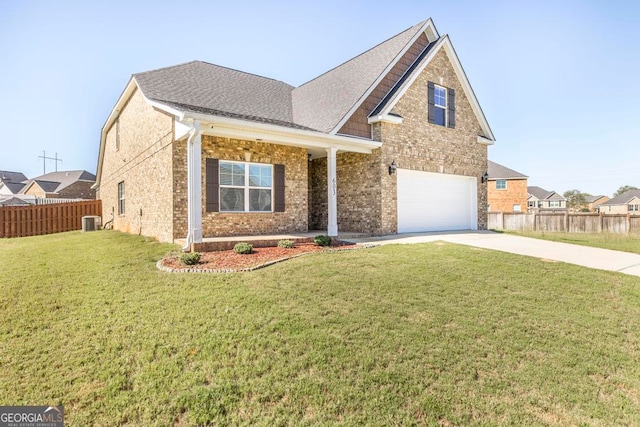 view of front of property featuring cooling unit, a front lawn, and a garage