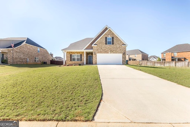 view of front facade with a front lawn and a garage