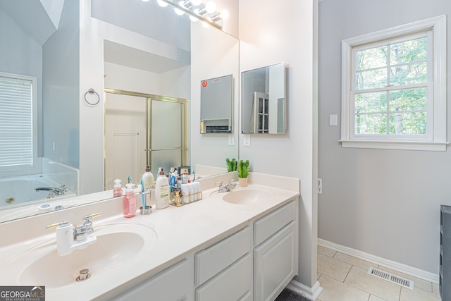 bathroom featuring vanity, separate shower and tub, and tile patterned flooring