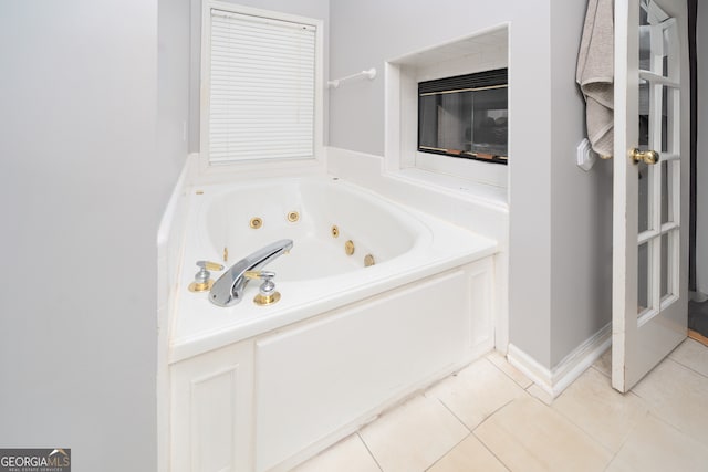 bathroom featuring a bathtub and tile patterned floors