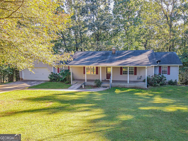 ranch-style house featuring a garage, a porch, and a front lawn