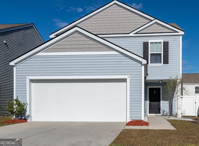 front of property with a garage