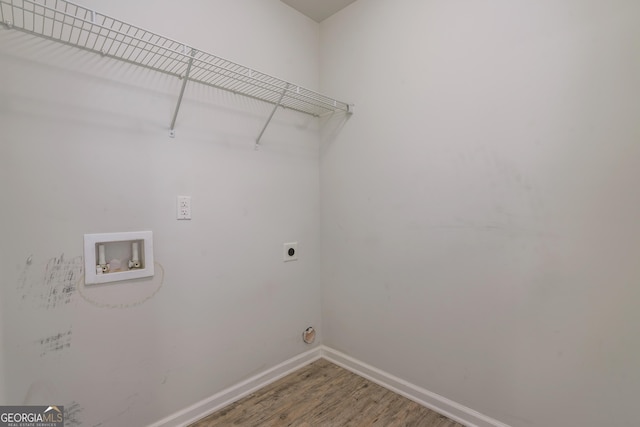 washroom featuring hardwood / wood-style floors, electric dryer hookup, and washer hookup