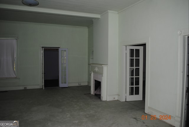 unfurnished living room featuring a fireplace and crown molding