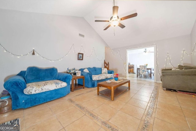 living room with vaulted ceiling, light tile patterned floors, and ceiling fan