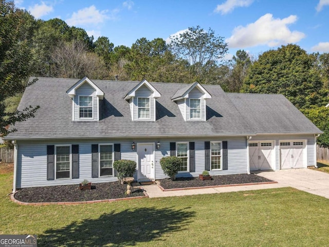 new england style home with a garage and a front lawn