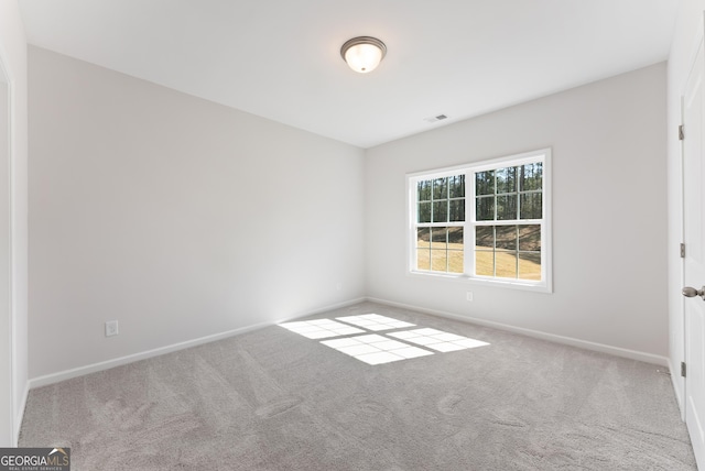 4060 Holstein Hl Unit 104, Columbus, GA 31904 - carpeted spare room with visible vents and baseboards