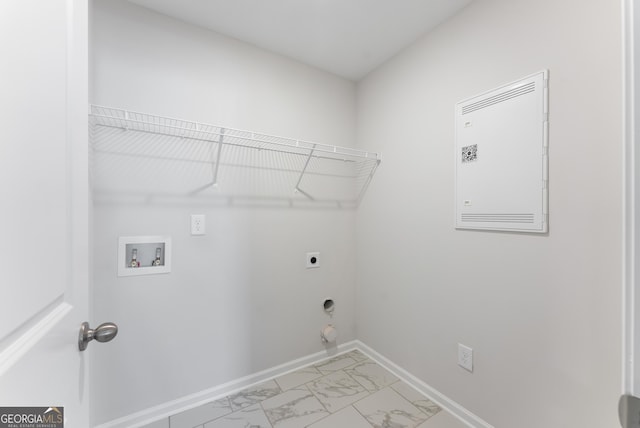 4060 Holstein Hl Unit 104, Columbus, GA 31904 - laundry area featuring baseboards, washer hookup, marble finish floor, electric dryer hookup, and laundry area