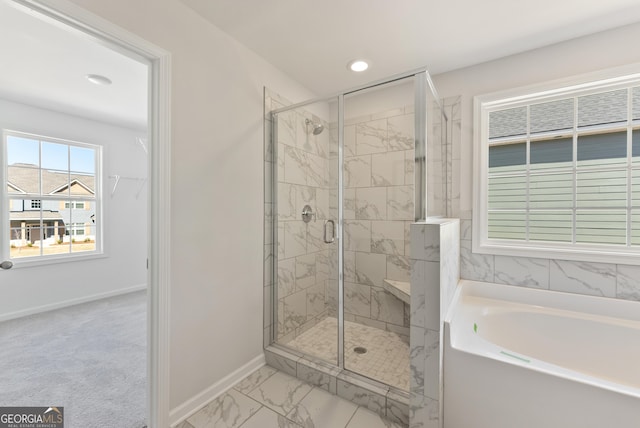 4060 Holstein Hl Unit 104, Columbus, GA 31904 - bathroom with a garden tub, a stall shower, marble finish floor, baseboards, and recessed lighting