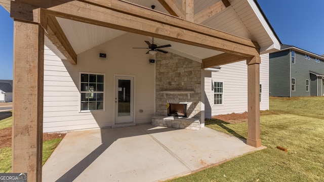 4060 Holstein Hl Unit 104, Columbus, GA 31904 - view of patio featuring an outdoor stone fireplace and a ceiling fan