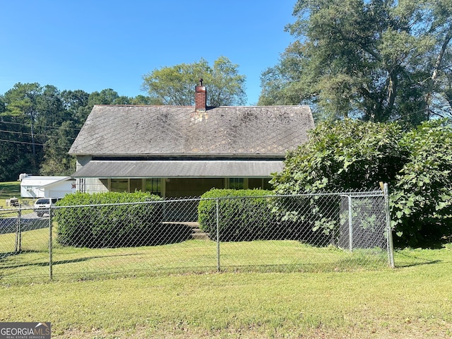 view of home's exterior featuring a lawn