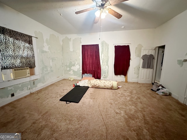 interior space featuring cooling unit, ceiling fan, and carpet flooring