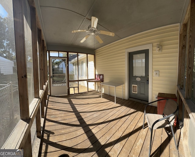 sunroom / solarium with ceiling fan