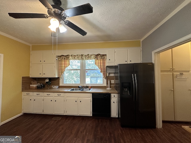 kitchen with sink, black appliances, dark hardwood / wood-style flooring, and white cabinets