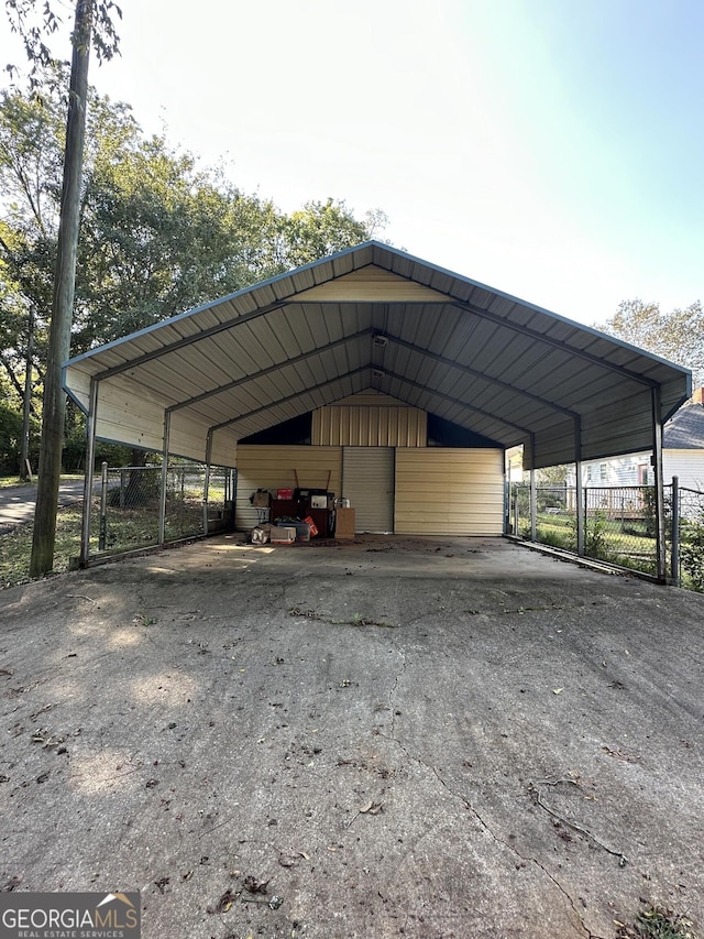 view of outbuilding with a carport