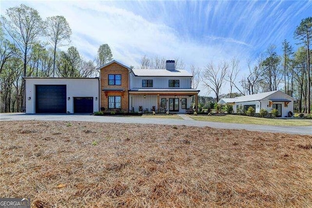 view of front of home with a garage