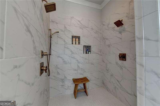 bathroom with tiled shower