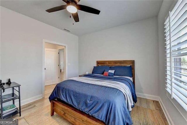 bedroom featuring ceiling fan and light wood-type flooring