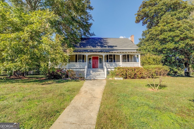 view of front of home featuring a porch and a front lawn