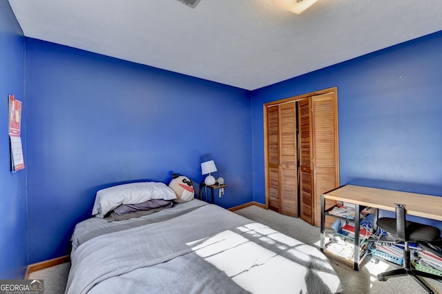 bedroom with carpet floors and a closet